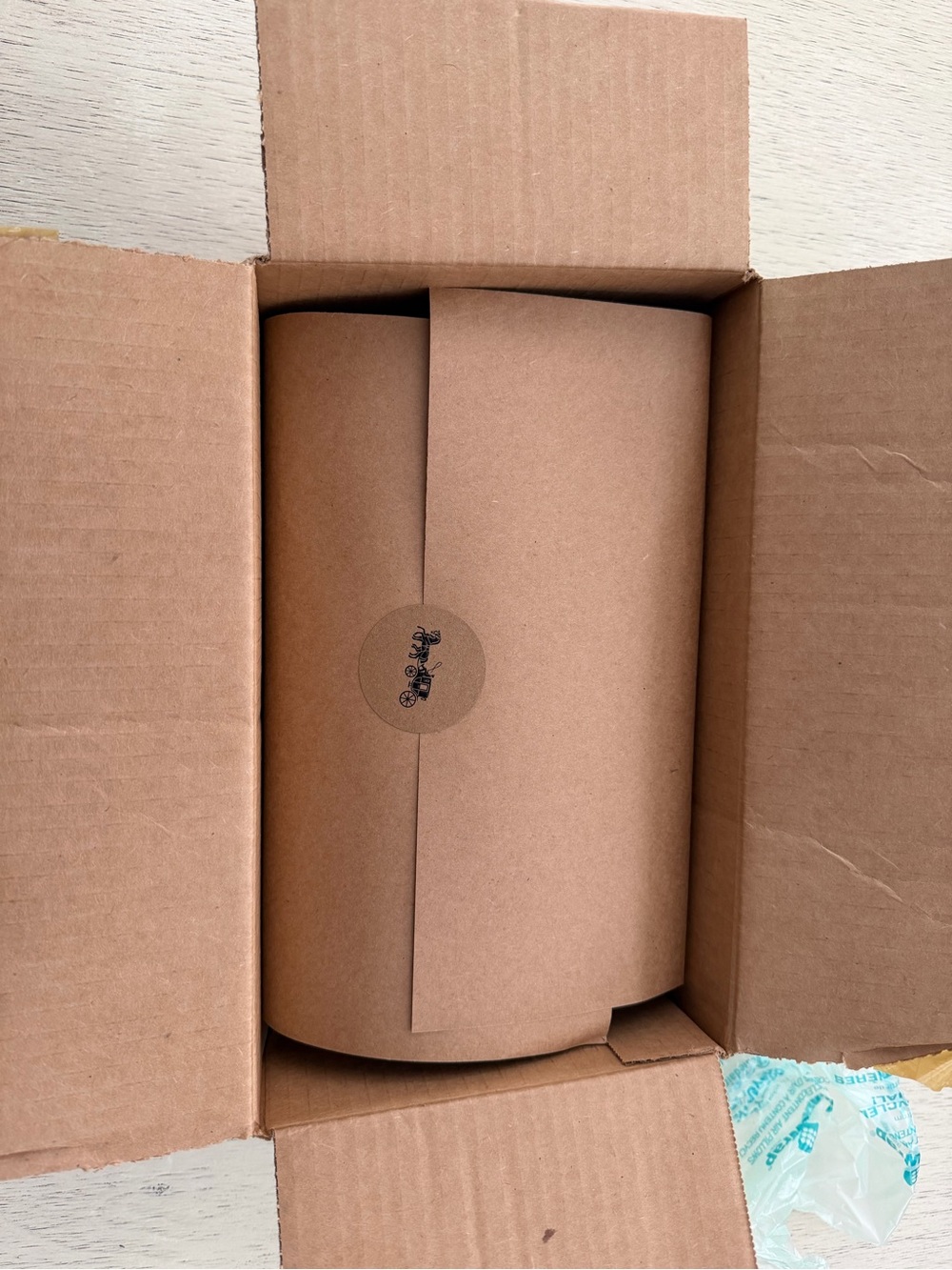 Coach Brown Kraft Gift Packaging with Branded Seal
